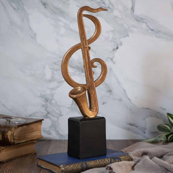 Декоративна статуетка ключ сол саксофон